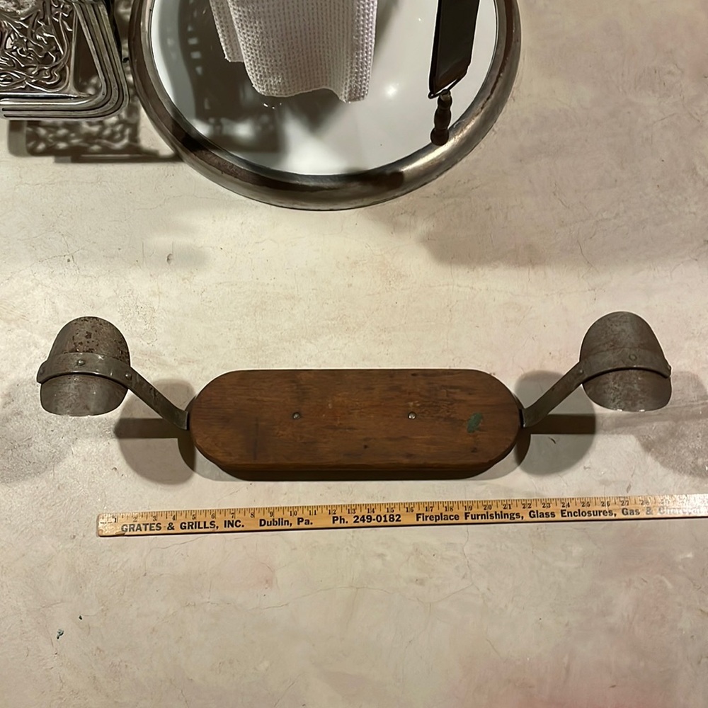 Antique child’s barber chair foot rest plate